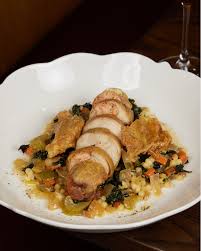 Carmelo's restaurant signature dishes Veal CarmeloLasagnaSausage and Peppers